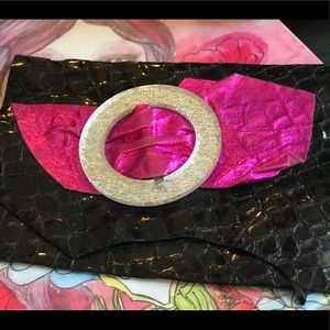 Handmade crocodile Miguel Torres clutch from LA